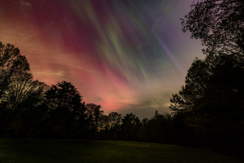 Nature Blog Aurora Borealis Northern Lights beautiful purples pinks greens in the starry sky